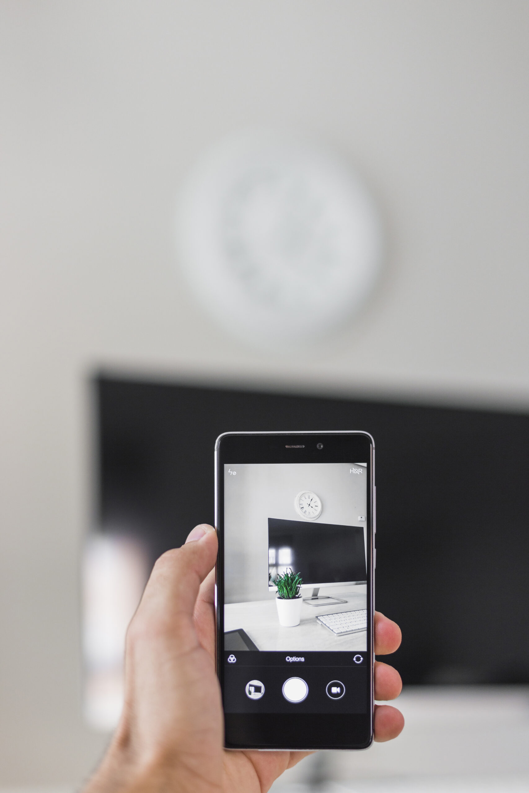 hand-with-smartphone-shooting-monitor-plant hand-with-smartphone-shooting-monitor-plant